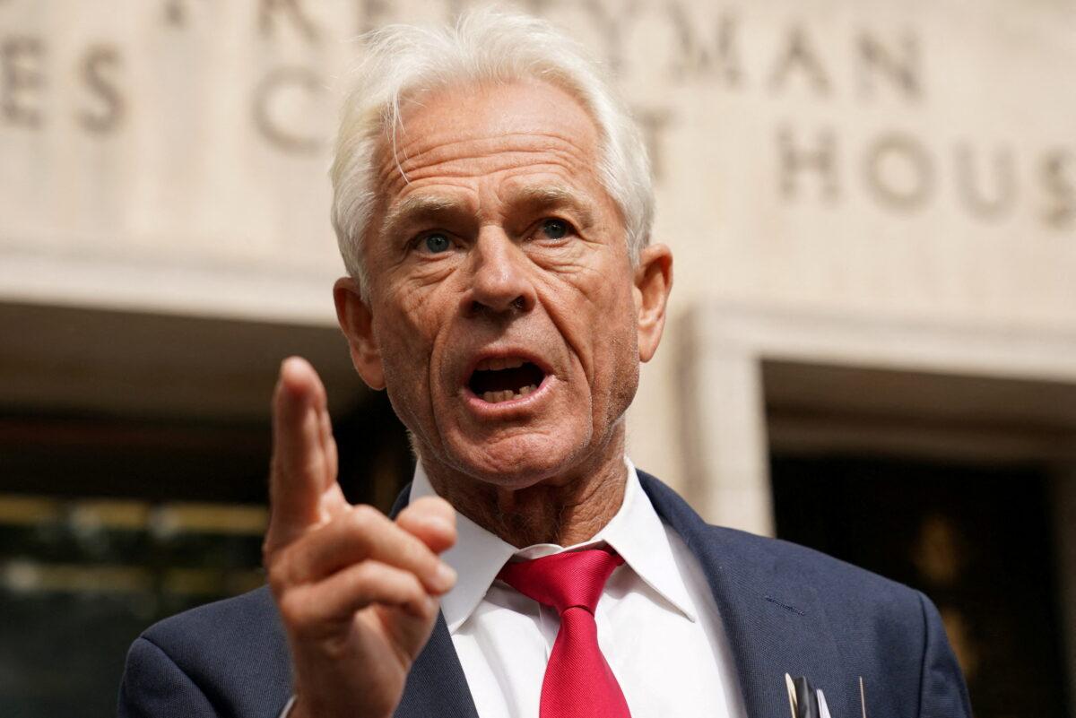 Peter Navarro, former trade adviser to President Donald Trump, speaks to reporters as he departs U.S. District Court after he was indicted on two counts of contempt of Congress for his failure to comply with a subpoena from the House of Representatives committee investigating the Jan. 6 attack on the U.S. Capitol, in Washington on June 3, 2022. (Kevin Lamarque/Reuters)