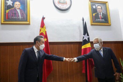 Former East Timorese leader Xanana Gusmao (R) greets Chinese Foreign Minister Wang Yi (L) during a meeting in Dili on June 4, 2022. (Valentino Dariel Sousa /AFP via Getty Images)