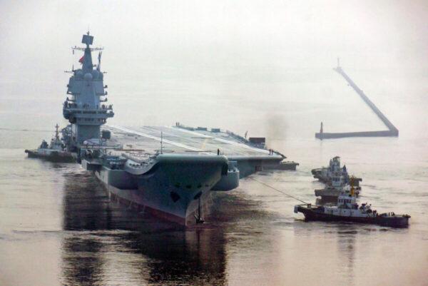 China's first home-built aircraft carrier sets out from the port of Dalian DSIC (Dalian Shipbuilding Industry Co.) Shipyard for sea trials in Dalian, Liaoning Province of China on May 13, 2018. (Getty Images)