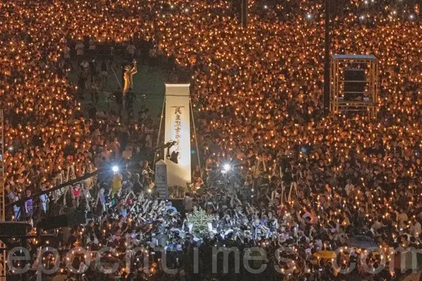 The candlelight vigil, hosted by The Alliance (HKASPDMC) to commemorate the 30th anniversary of the Tiananmen Massacre, at Victoria Park in Hong Kong on June 4, 2019. (Choi Manman/The Epoch Times)