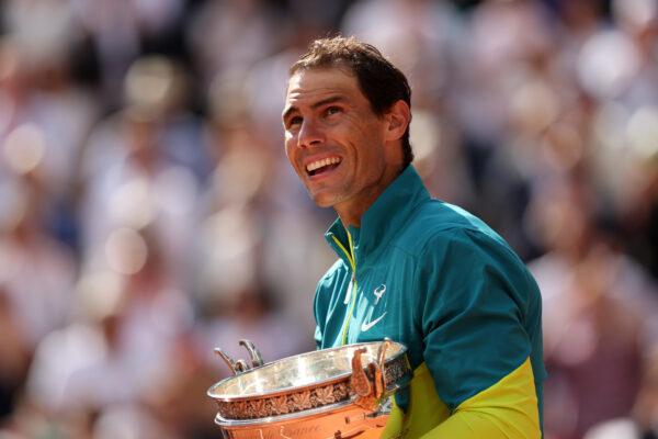 Rafael Nadal of Spain celebrates with the trophy after winning against Casper Ruud of Norway during the Men's Singles Final match on Day 15 of The 2022 French Open at Roland Garros in Paris on June 5, 2022. (Clive Brunskill/Getty Images)