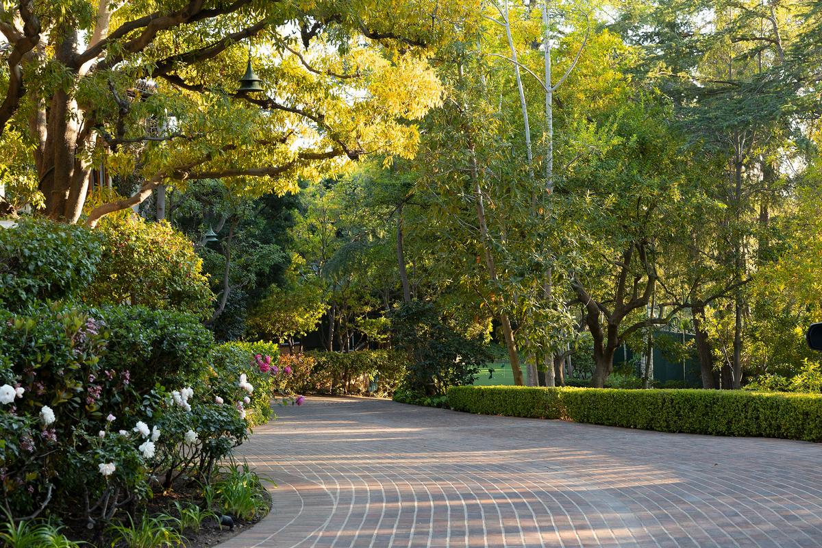 The private drive of the estate winds through one of the largest estates in this area of California. The grounds and location serve to accent a modern architectural masterpiece. (Jim Bartsch/Jade Mills)