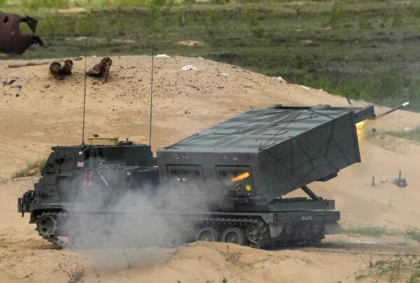 The British Army's M270 Multiple Launch Rocket System (MLRS) fires during Summer Shield 2022 military exercise in Adazi military base, Latvia, on May 27, 2022. (Ints Kalnins /Reuters)