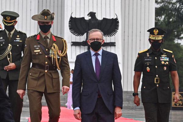 Australian Prime Minister Anthony Albanese (C) walks after laying a wreath at the Kalibata National Heroes Cemetery in Jakarta, Indonesia on June 6, 2022. Albanese made his first trip to Indonesia promising to strengthen ties during two days of diplomatic and business meetings. (Adek Berry/AFP via Getty Images)