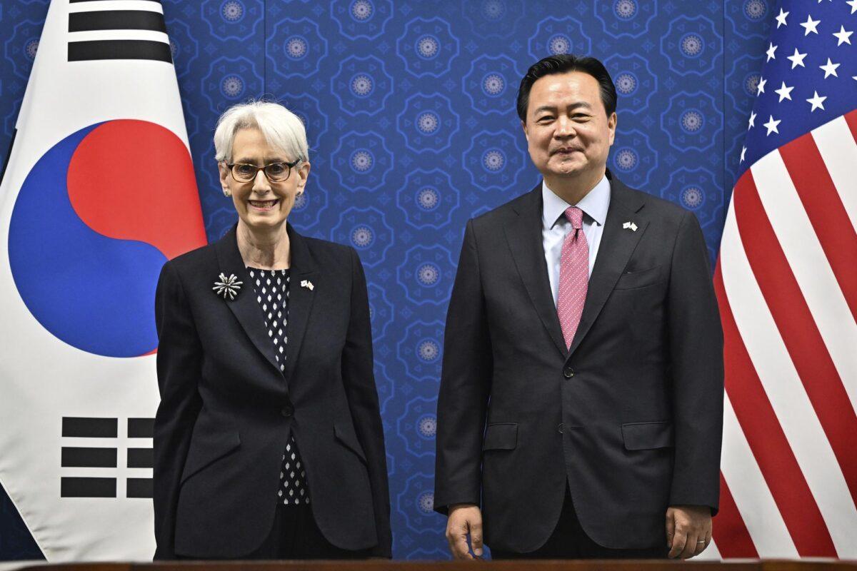 South Korea's First Vice Foreign Minister Cho Hyun-dong, right, and U.S. Deputy Secretary of State Wendy Sherman pose for a photo during their meeting at the Foreign Ministry in Seoul, on June 7, 2022. (Jung Yeon-je /Pool Photo via AP)
