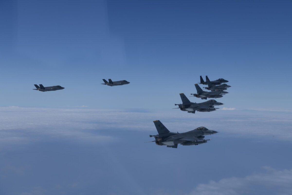 In this photo provided by South Korea Defense Ministry, U.S. and South Korea Air Force fighter jets fly in formation during a joint drill on June, 7, 2022. (South Korea Defense Ministry via AP)