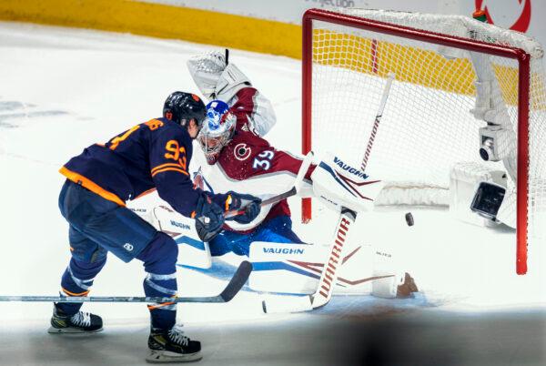 Colorado Avalanche goalie Pavel Francouz (39) lets in a goal by Edmonton Oilers' Ryan Nugent-Hopkins (93) during second period NHL hockey playoff hockey action in Edmonton, Alberta, on June 6, 2022. (Amber Bracken/The Canadian Press via AP)