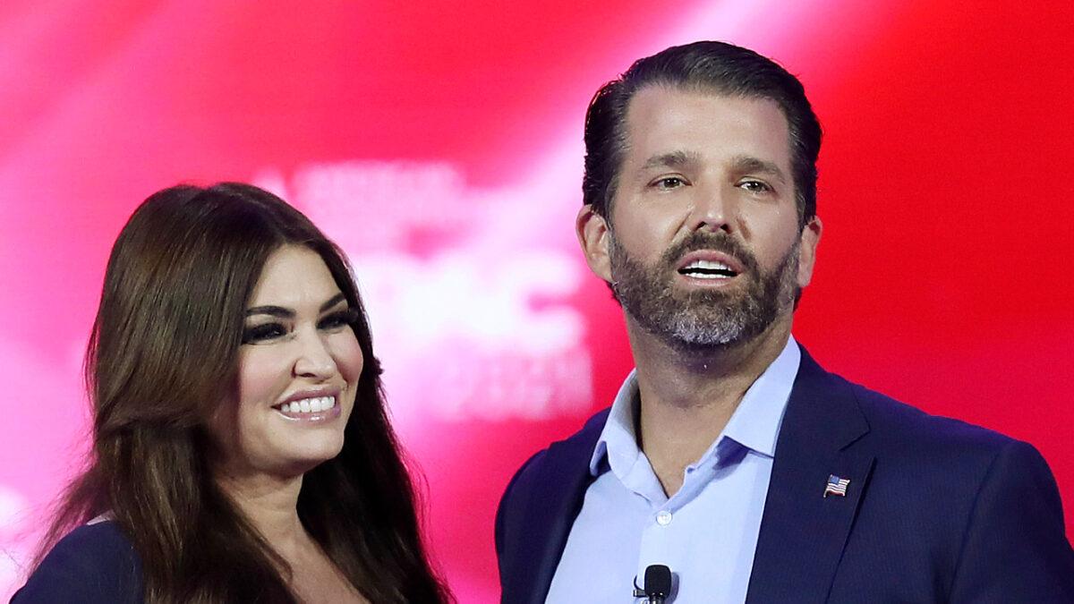 Donald Trump Jr. (R) and Kimberly Guilfoyle stand on stage as they address the Conservative Political Action Conference being held in the Hyatt Regency in Orlando, Fla., on Feb. 26, 2021. (Joe Raedle/Getty Images)