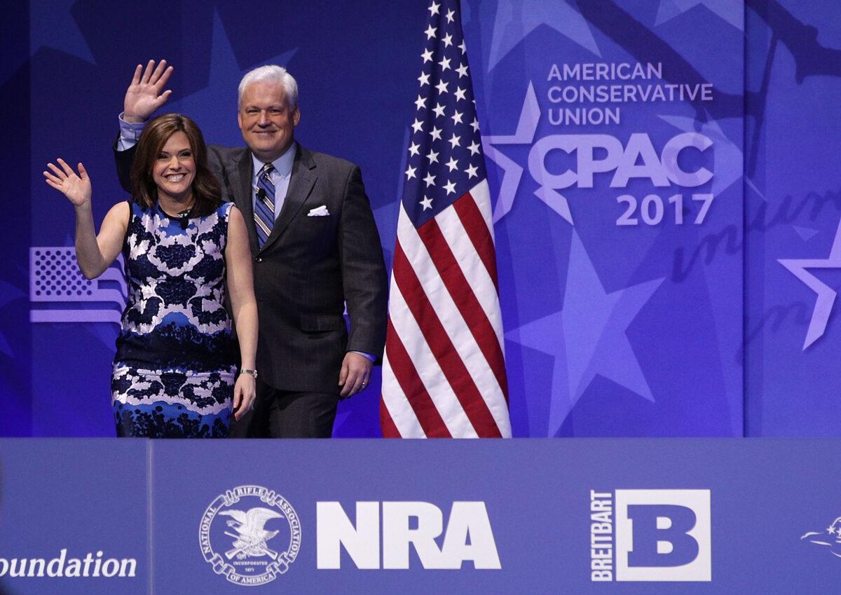 American Conservation Union Chairman Matt Schlapp (R) and his wife, political commentator Mercedes Schlapp (L), acknowledge the crowd during the Conservative Political Action Conference at the Gaylord National Resort and Convention Center in National Harbor, Md., on Feb. 24, 2017. (Alex Wong/Getty Images)