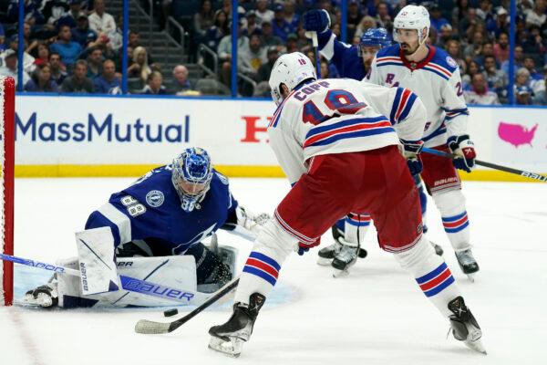 Tampa Bay Lightning goaltender Andrei Vasilevskiy (88) stops a shot by New York Rangers center Andrew Copp (18) during the third period in Game 4 of the NHL hockey Stanley Cup playoffs Eastern Conference finals in Tampa, Fla., on June 7, 2022. (Chris O'Meara/AP Photo)