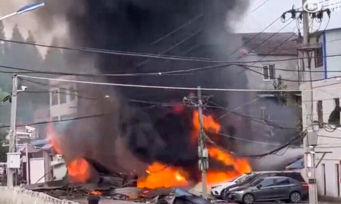 Chinese Military Jet Crashes Into Houses, Killing at Least 1