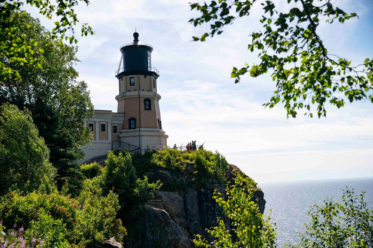 Visitors take photos of Lake Superior from the historic Split Rock Lighthouse on July 15, 2020. (Alex Kormann/Minneapolis Star Tribune/TNS)