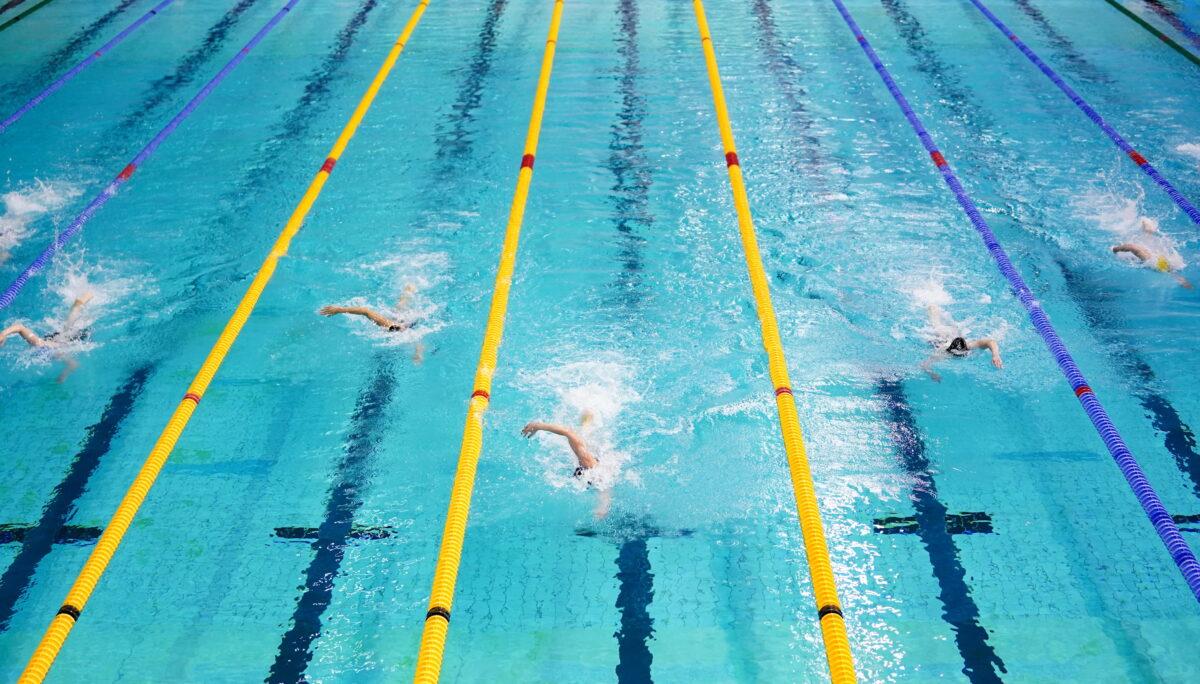 Undated file photo showing swimmers in a pool. (Zac Goodwin/PA Media)