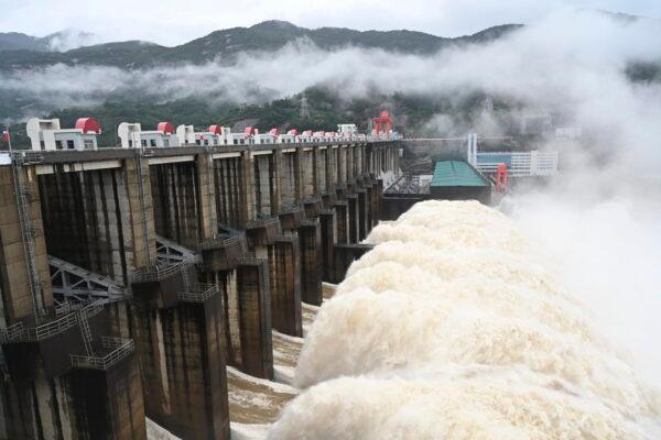 Water flows out from a gate of the Shuikou Hydropower Station in southeastern China's Fujian Province on June 13, 2022. (Lin Shanchuan/Xinhua via AP)