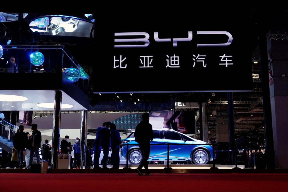 People visit the BYD booth during a media day for the Auto Shanghai show in Shanghai on April 19, 2021. (Aly Song/Reuters)