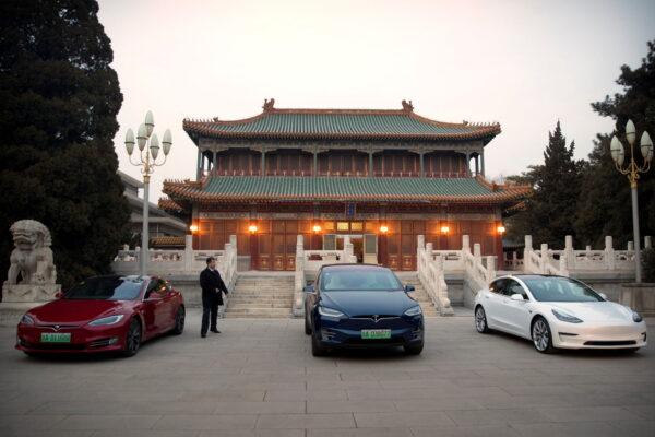  Tesla vehicles are parked outside a building at the Zhongnanhai leadership compound, in Beijing on Jan. 9, 2019. (Mark Schiefelbein/Pool via Reuters)