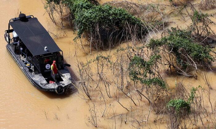 Brazil Police Find Apparent Human Remains in River Where Reporter Vanished