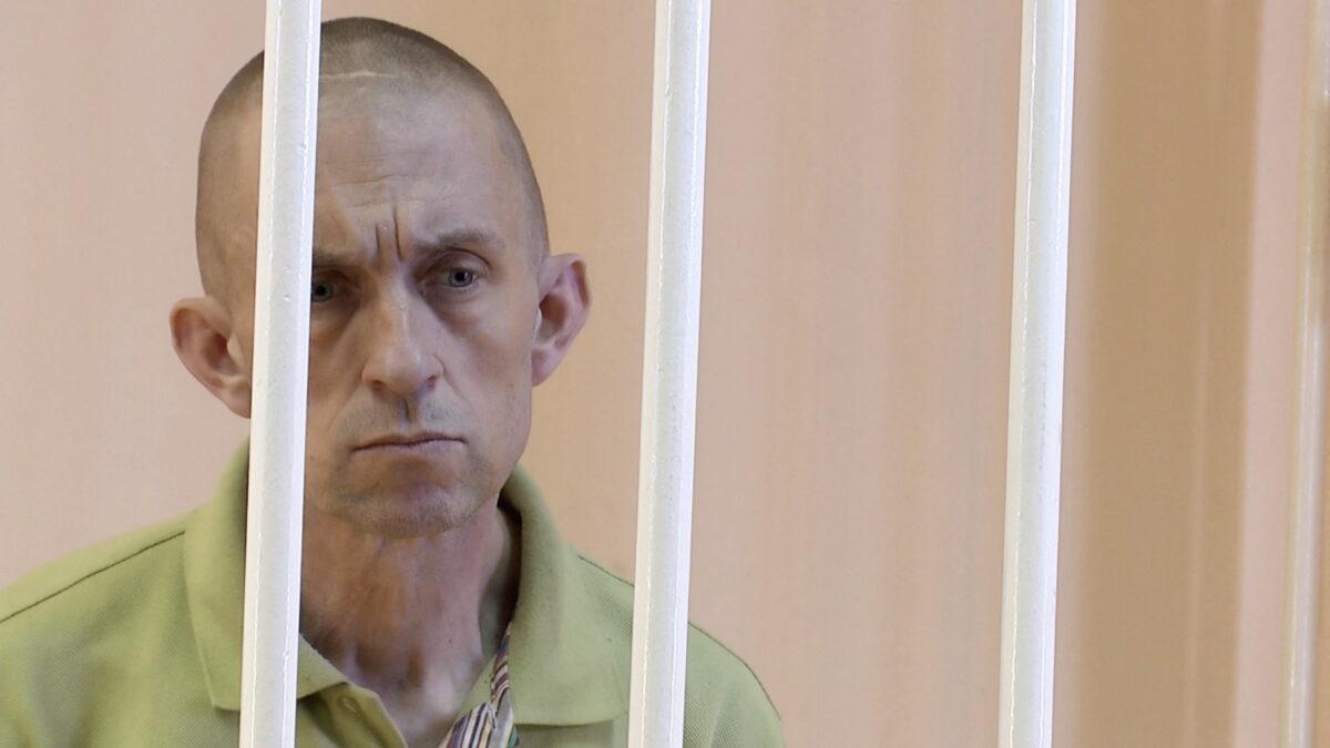 British citizen Shaun Pinner in a courtroom cage at a location given as Donetsk, Ukraine, in a still image from a video released on June 8, 2022. (Supreme Court of Donetsk People's Republic/Handout via ReutersTV)