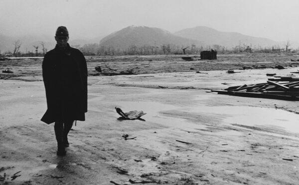 A Japanese soldier walks through the atomic bomb-leveled city of Hiroshima, Japan, in September 1945. Photographed by Lt. Wayne Miller, USNR. (NARA)