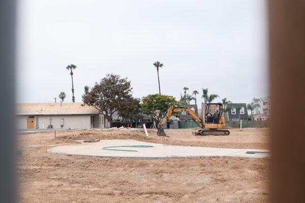 A new community park at the crossing of 17th Street and Orange Avenue in Huntington Beach, Calif., is under construction on June 10, 2022. (Julianne Foster/The Epoch Times)
