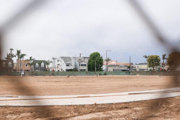 A new community park at the crossing of 17th Street and Orange Avenue in Huntington Beach, Calif., is under construction on June 10, 2022. (Julianne Foster/The Epoch Times)