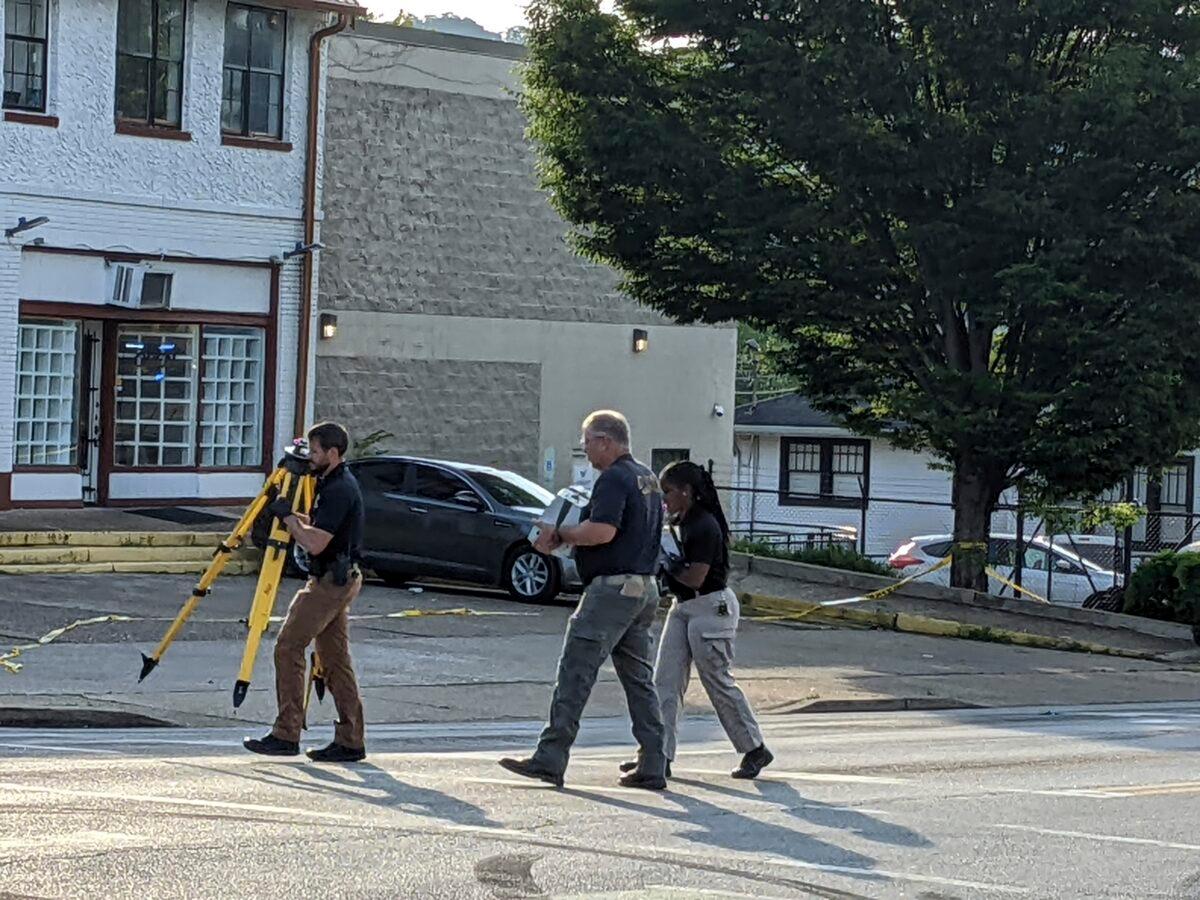 The Chattanooga Police Department investigate the scene of a shooting in Chattanooga, Tenn., on June 5, 2022. (Tierra Hayes/Chattanooga Times Free Press via AP)
