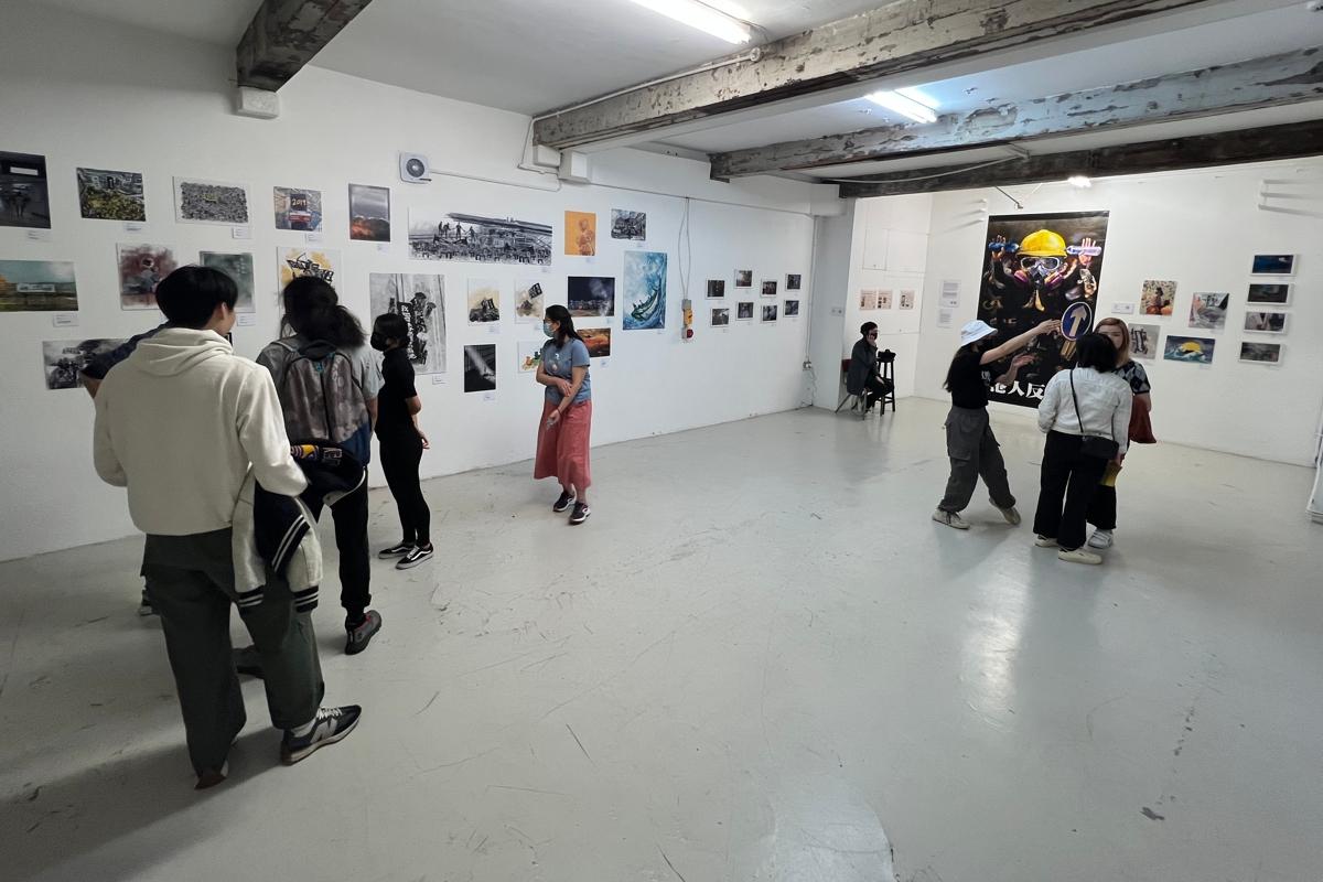 The exhibition, named "From Brick Array to the World: Awakening and Change of Hongkongers" was held in London on June 11 and 12, 2022, exhibiting nearly 100 works, by more than 10 artists, on the anti-extradition movement. (Angela Chen/The Epoch Times UK)