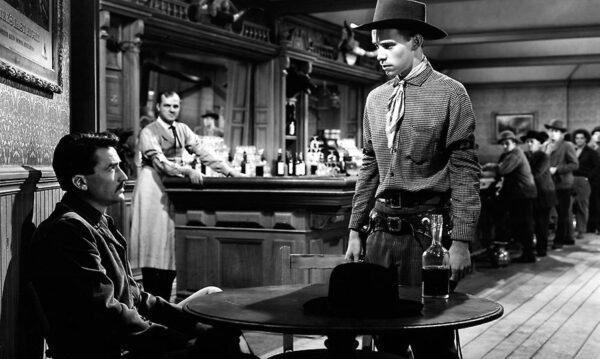 Wherever Jimmy Ringo (Gregory Peck, L) goes, there’s a young hothead, here Hunt Bromley (Skip Homeier), hoping to outgun him. (20th Century Fox)