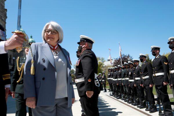 Gov. Gen. Mary Simon inspects members of the Guard of Honour comprised of 50 members of the Maritime Forces Pacific, at the legislature in Victoria, B.C., on May 20, 2022. (Chad Hipolito/The Canadian Press)