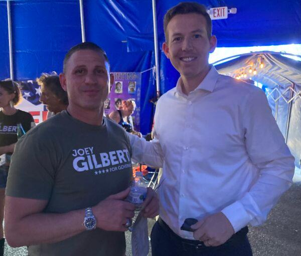 Nevada GOP gubernatorial candidate Joey Gilbert (left) and Congressional District 3 hopeful Clark Bossert at a rally ahead of the June 14 primary. (John Haughey/The Epoch Times)