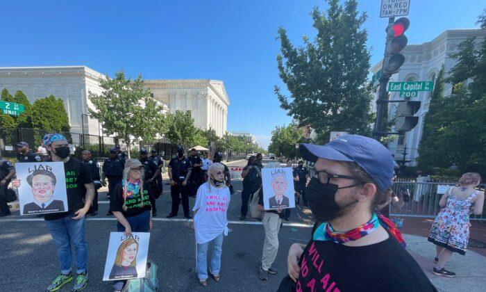 Pro-Abortion Protesters Block Streets Outside Supreme Court
