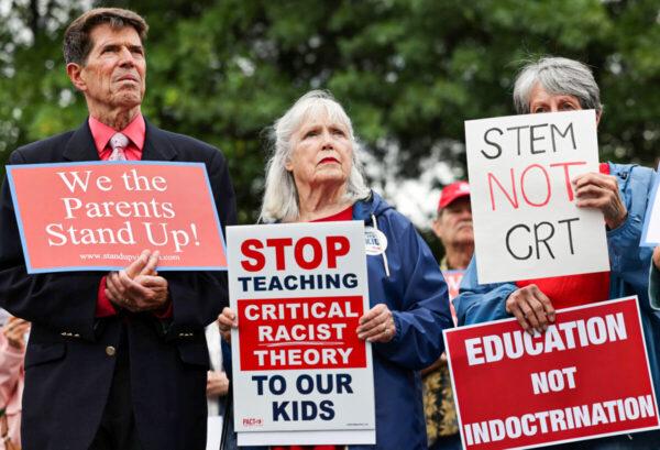 Opponents of the academic doctrine known as critical race theory protest outside of the Loudoun County School Board headquarters in Ashburn, Va., on June 22, 2021. (Evelyn Hockstein/Reuters)