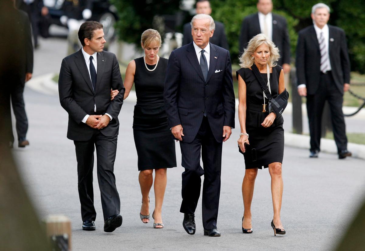 Then Vice President Joe Biden (2-R) arrives at Arlington National Cemetery with his wife, Jill Biden (R), son Hunter Biden (L) and daughter-in-law, Kathleen Biden for the burial of U.S. Sen. Edward Kennedy in Arlington, Va., on Aug. 29, 2009. (Jim Bourg-Pool/Getty Images)