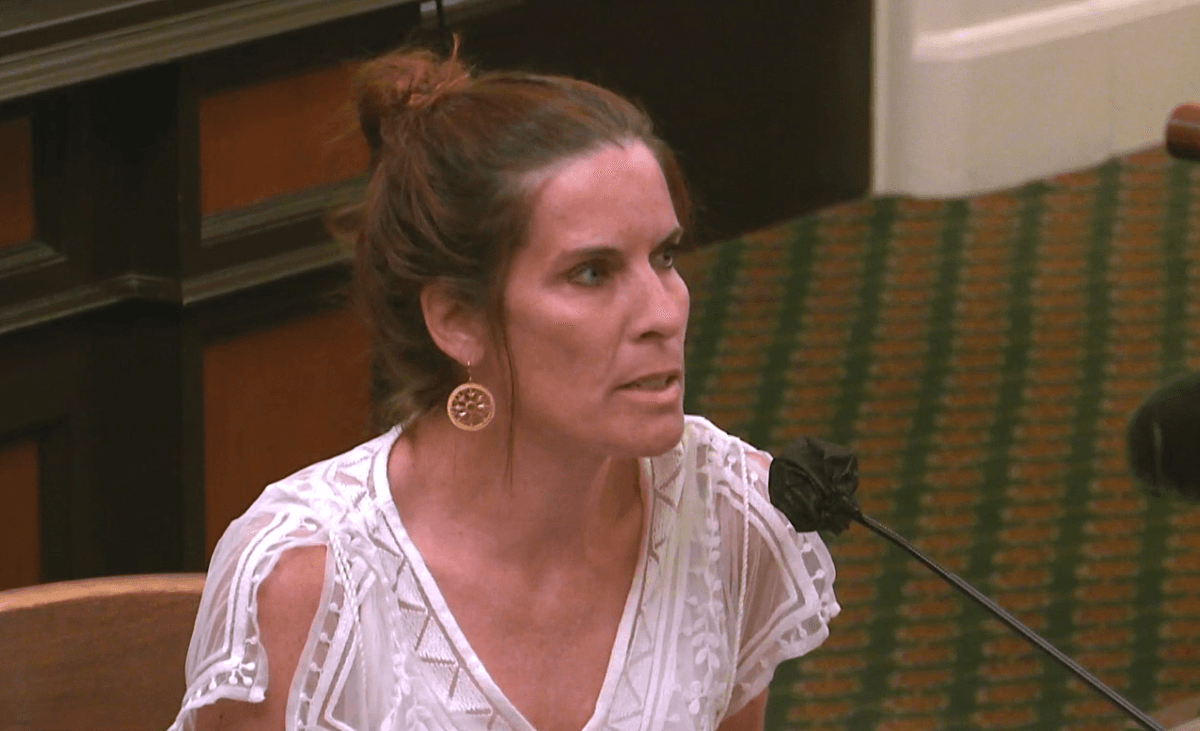  Erin Friday, the mother of a teen who once suffered from gender dysphoria, speaks at a California Assembly judiciary committee hearing in Sacramento on June 8, 2022. (Screenshot via California State Assembly)