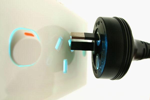 A power plug is placed into a power socket in Melbourne, Australia, on Oct. 22, 2012. (Quinn Rooney/Getty Images)