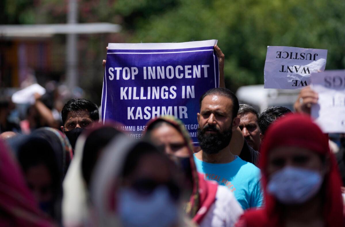 People march in a protest against the minority killings in Jammu, Kashmir, India, on June 2, 2022. (Channi Anand/AP Photo)