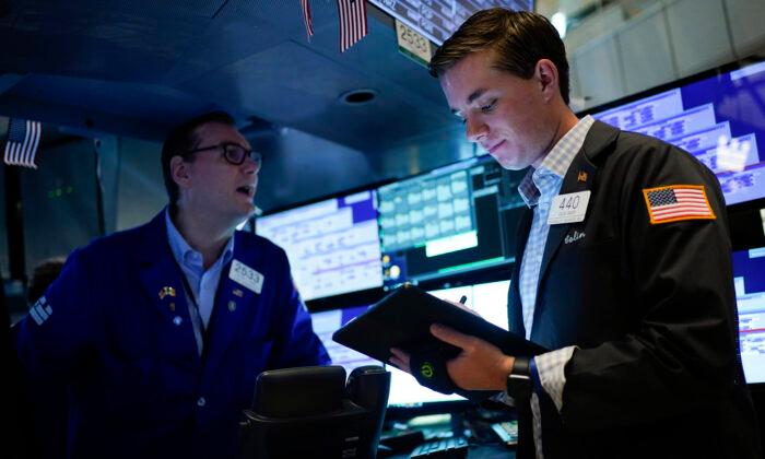 Wall Street Rallies in Relief After Fed’s Assurance on Rates