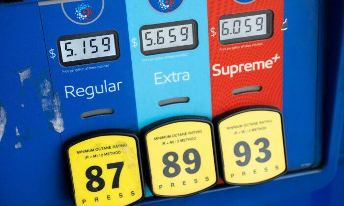US Average Gas Prices Drop Below $5 Per Gallon