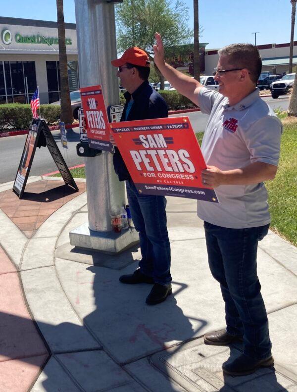 Republican Congressional District 4 candidate Sam Peters and supporters call on voters at the Centennial Center in Centennial Hills north of Las Vegas to vote for him in Nevada’s June 14, 2022, primary. (John Haughey/The Epoch Times)