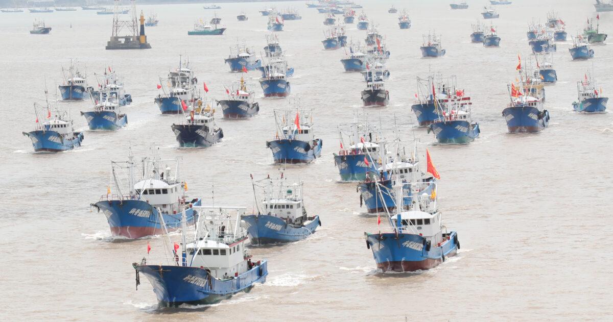 Fishing boats set sail for the East China Sea from a port in Zhoushan, Zhejiang Province of China, on Aug. 1, 2021. (Chen Yongjian/VCG via Getty Images)