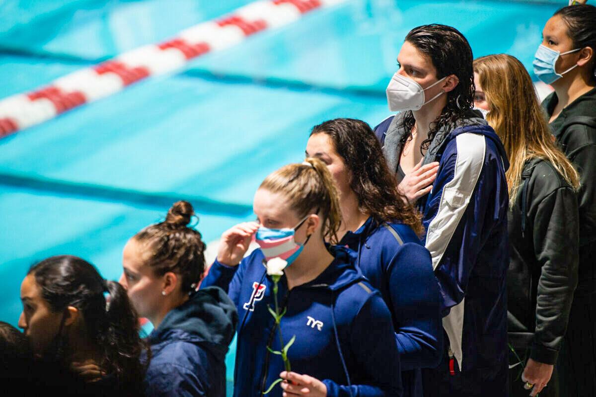 University of Pennsylvania transgender swimmer Lia Thomas places her hand over her heart during the playing of the National Anthem at the 2022 Ivy League Championships at Blodgett Pool in Cambridge, Mass., on Feb. 19, 2022. (Kathryn Riley/Getty Images)
