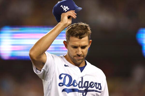 Tyler Anderson #31 of the Los Angeles Dodgers tips his hat to the crowd after being relieved during a game against the Los Angeles Angels in the ninth inning at Dodger Stadium, in Los Angeles, on June 15, 2022. (Michael Owens/Getty Images)
