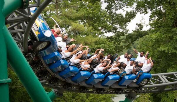 In this handout image provided by Busch Gardens, Redskins players and Redskins cheerleaders ride through the Black Forest aboard Verbolten, a multi-launch roller coaster at Busch Gardens Williamsburg in Williamsburg, Virginia on June 2, 2012. (Handout/Getty Images)