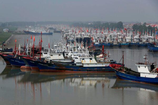 Fishing boats berthed at a port in Lianyungang, in eastern China's Jiangsu Province, on May 30, 2016. (STR/AFP via Getty Images)