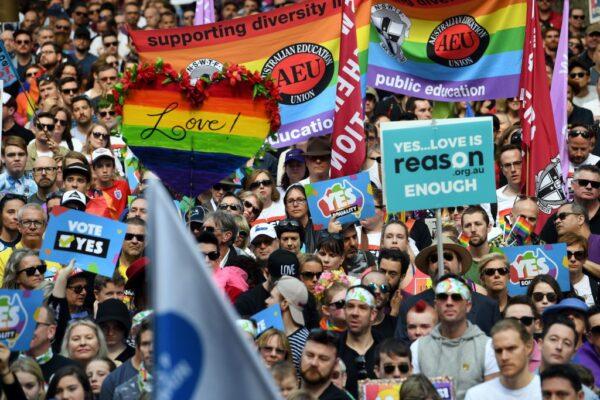 Supporters hold placards as they attend a same-sex marriage rally in Sydney, Australia, on Sept. 10, 2017. (Saeed Khan/AFP via Getty Images)