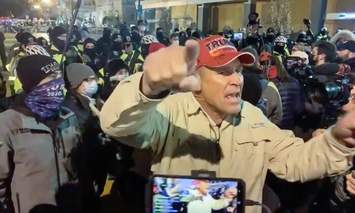 Ray Epps encourages protesters to go into the Capitol the night before the siege of Jan. 6, 2021. (Villain Report/Screenshot via The Epoch Times)