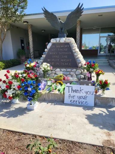 Local officials and community members mourn the two El Monte officers killed in the line of duty at a June 14 motel shooting in front of the El Monte Police Department on June 15, 2022. (Jackie Rios/NTD Television)