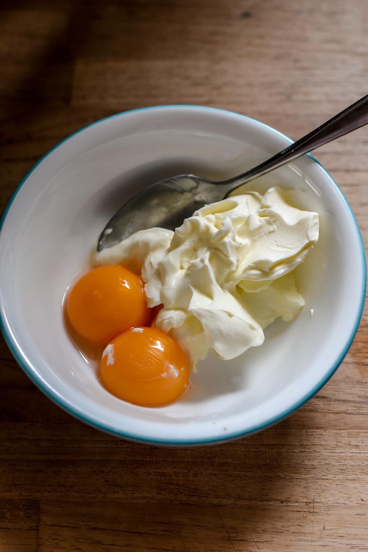 Whisk together creme fraiche and egg yolks for the migaine. (Audrey Le Goff)