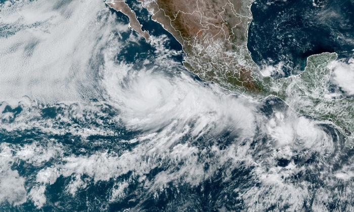 Hurricane Blas Heads out to Sea Off Southern Mexico