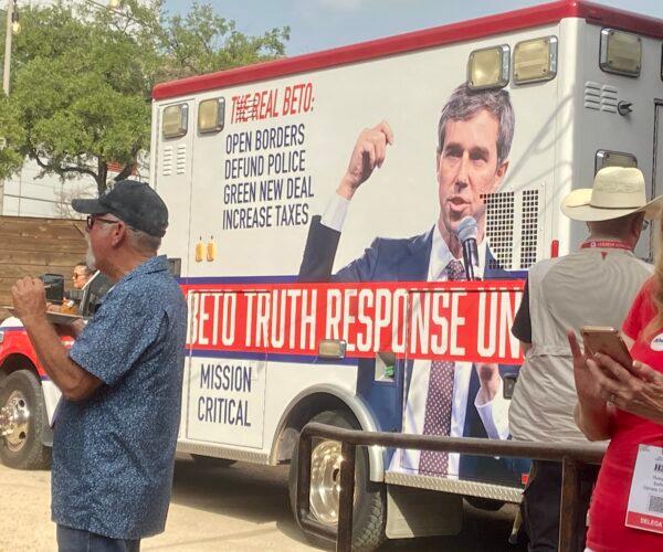 Gov. Greg Abbott (R-Texas) displays the "Beto Truth Response Unit" in Houston, June 16, 2022. The ambulance will follow his Democratic opponent on the campaign trail. (Darlene McCormick Sanchez/The Epoch Times)